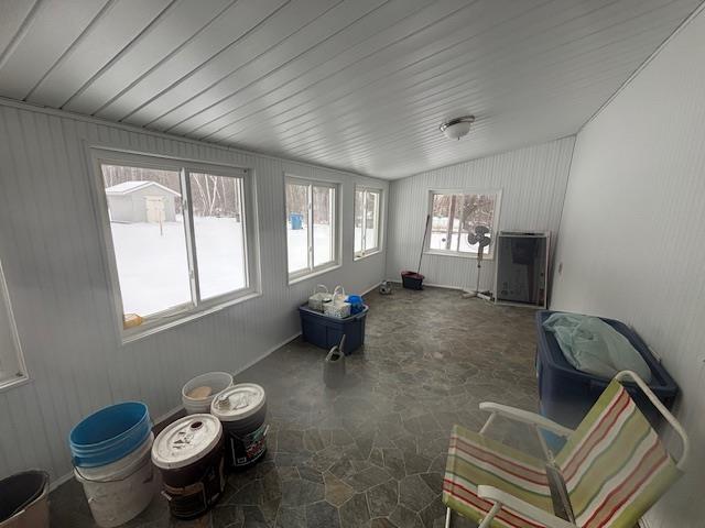 sunroom with vaulted ceiling