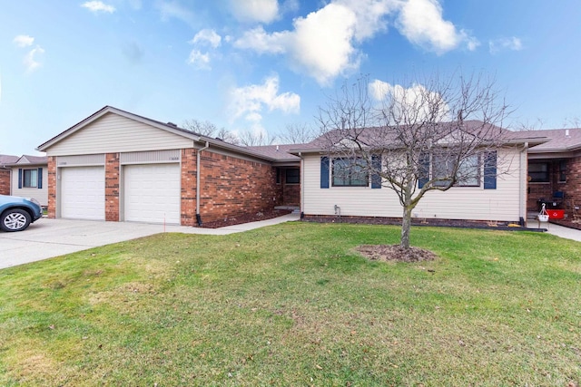 ranch-style house featuring a garage and a front lawn