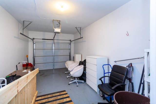 garage with fridge and a garage door opener