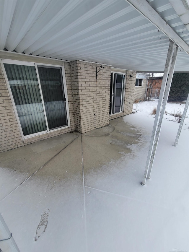 view of snow covered patio