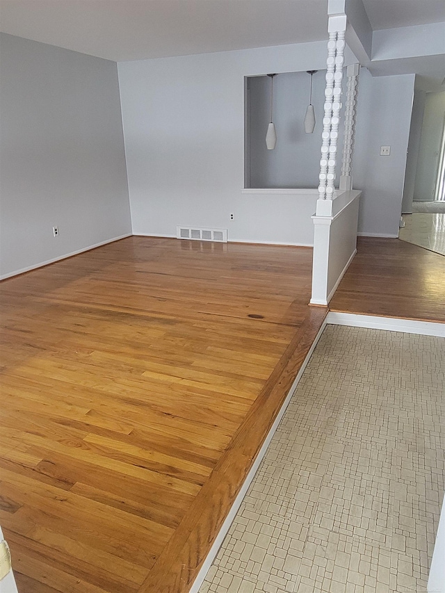 empty room featuring hardwood / wood-style floors