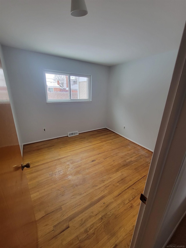 empty room featuring light hardwood / wood-style flooring