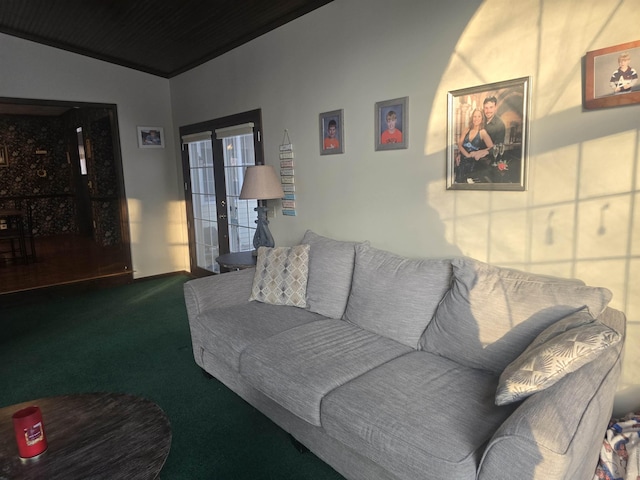 carpeted living room with lofted ceiling