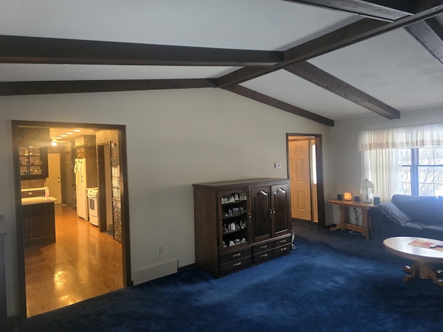 carpeted living room with vaulted ceiling with beams