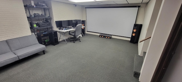 office featuring carpet flooring and a drop ceiling