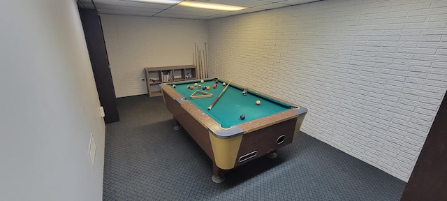 playroom with billiards, a drop ceiling, and dark carpet