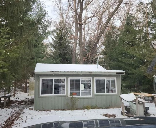 view of snow covered property