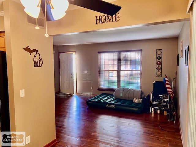 living room with dark wood-type flooring