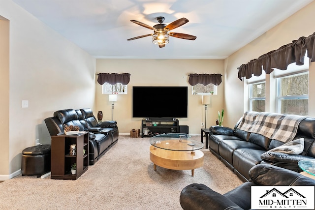 carpeted living room featuring ceiling fan