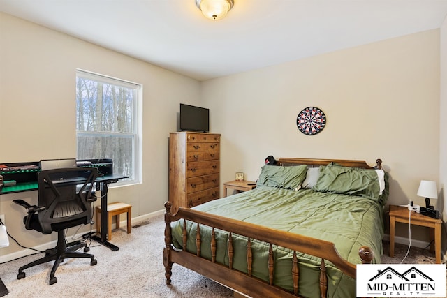 bedroom featuring light colored carpet