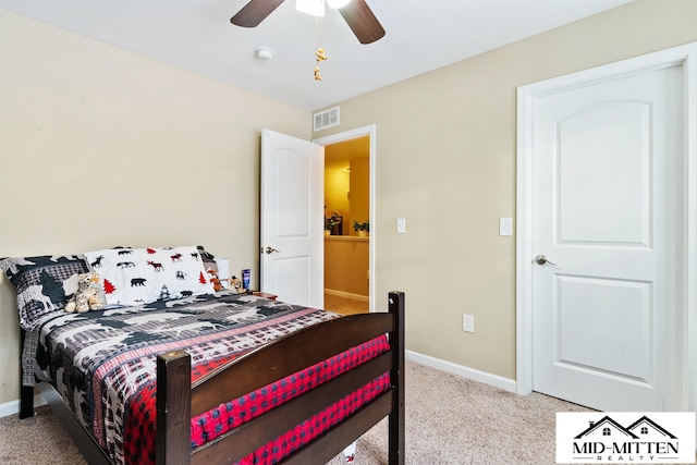 carpeted bedroom featuring ceiling fan