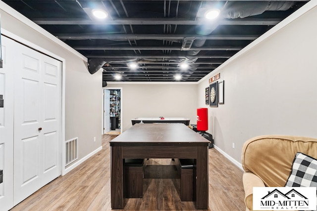 recreation room featuring hardwood / wood-style flooring