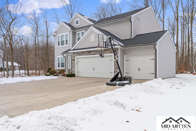 view of front of property with a garage