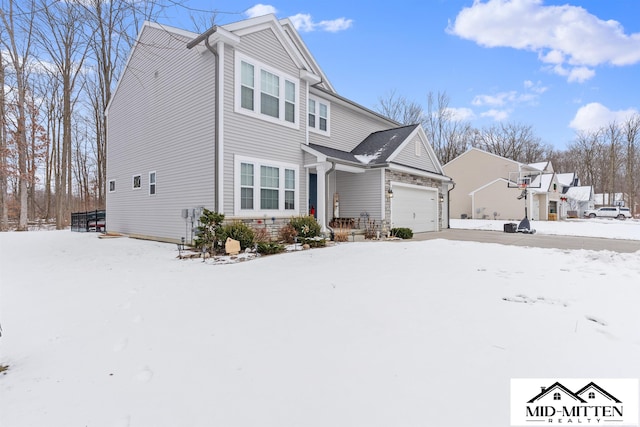 view of front of property featuring a garage