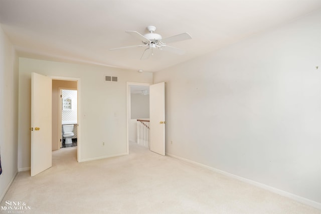 unfurnished bedroom with ceiling fan and light carpet