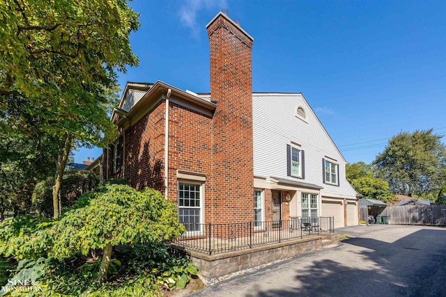 view of property exterior with a garage