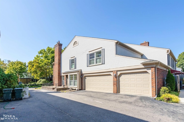 view of property featuring a garage