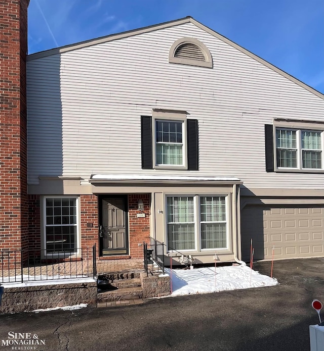 view of front of property featuring a garage