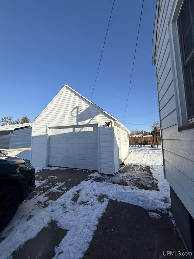 view of snow covered garage