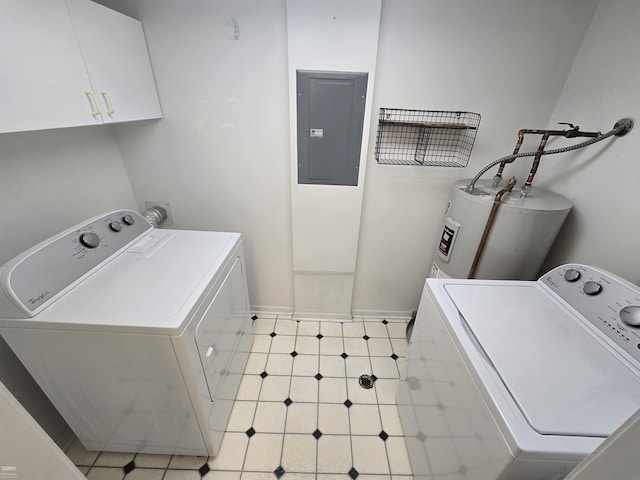 laundry room with washing machine and dryer, water heater, electric panel, and cabinets