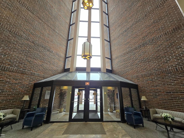 view of exterior entry featuring french doors