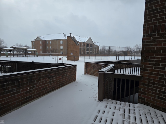 view of snow covered patio