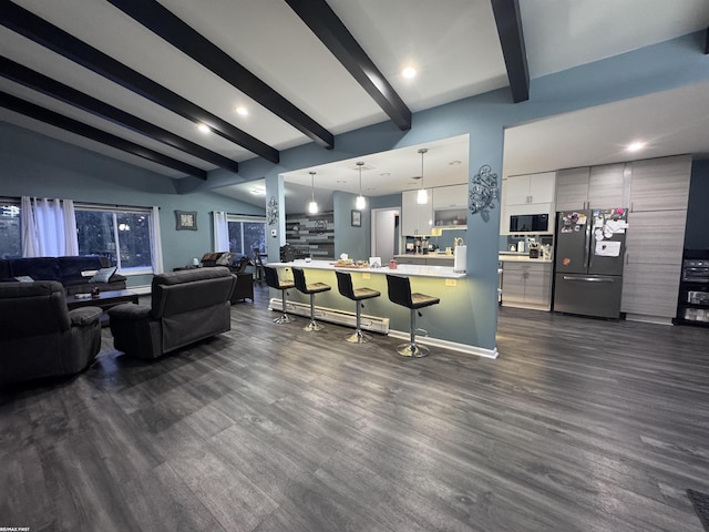 living area with lofted ceiling with beams, recessed lighting, and dark wood-style flooring