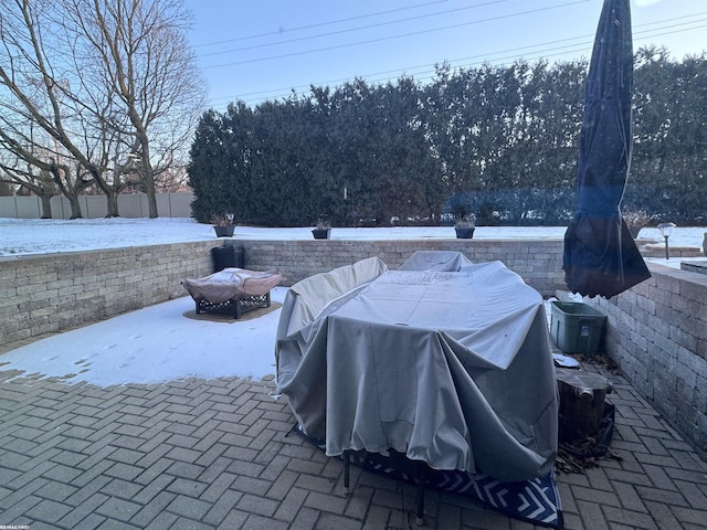 view of patio featuring fence