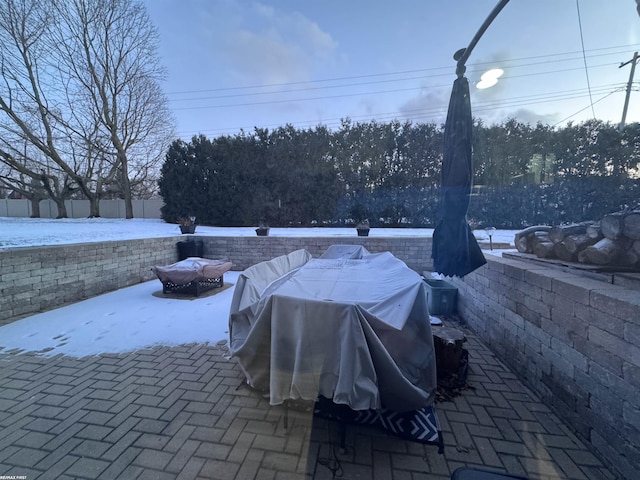 view of patio with grilling area and fence