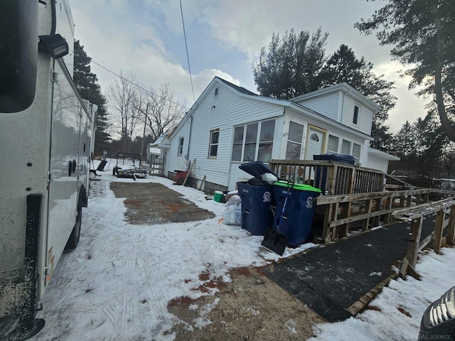 view of snow covered property