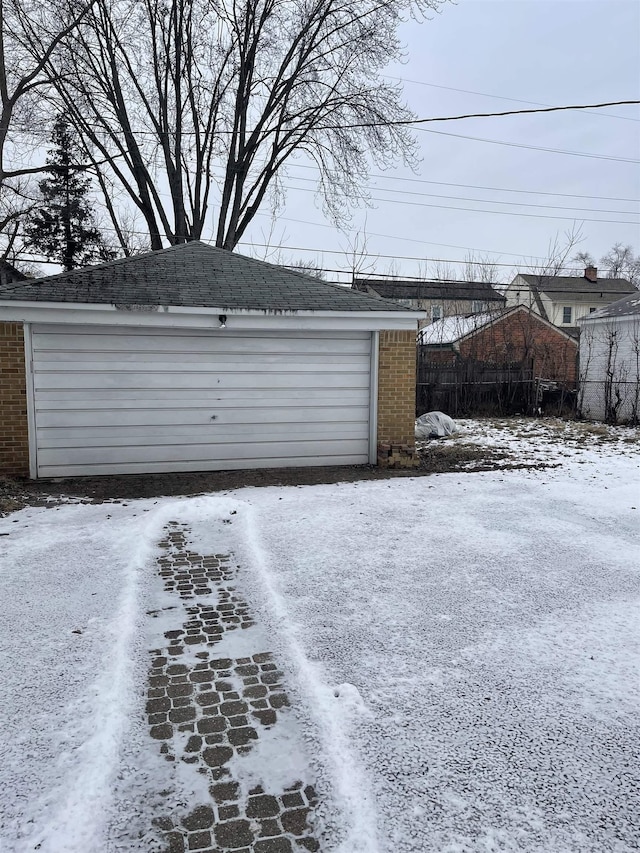 view of snow covered garage