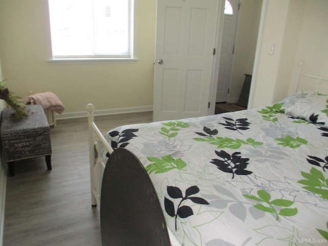 bedroom featuring hardwood / wood-style flooring