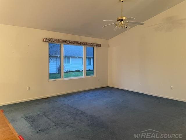 unfurnished room with ceiling fan and lofted ceiling