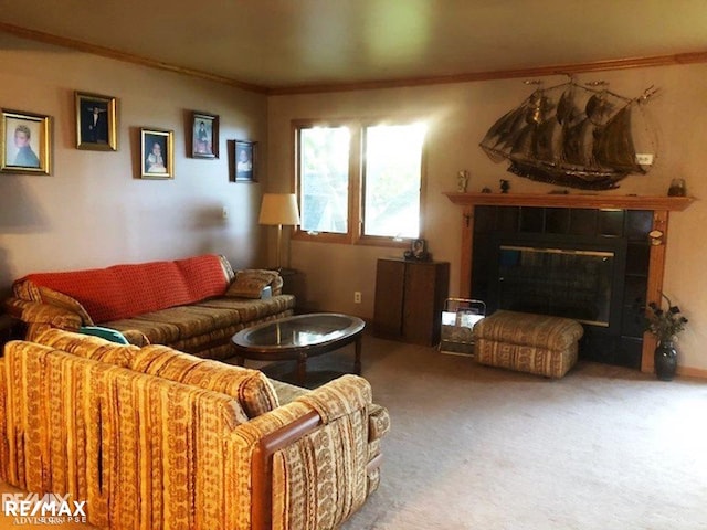 carpeted living room with crown molding and a tiled fireplace