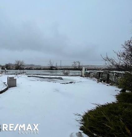 view of yard covered in snow