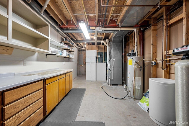 basement with electric panel, heating unit, and gas water heater