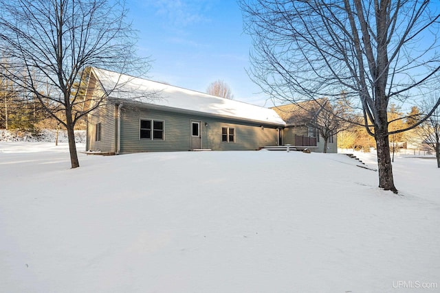 view of snow covered property