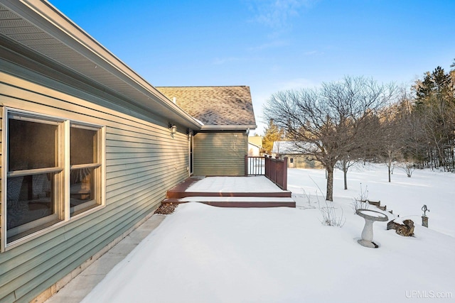 view of yard covered in snow