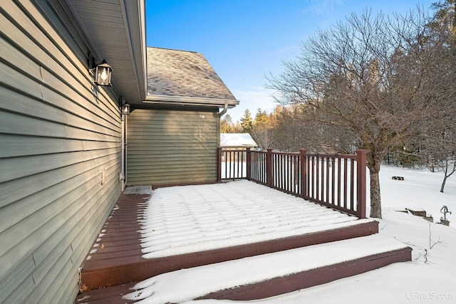 view of snow covered deck