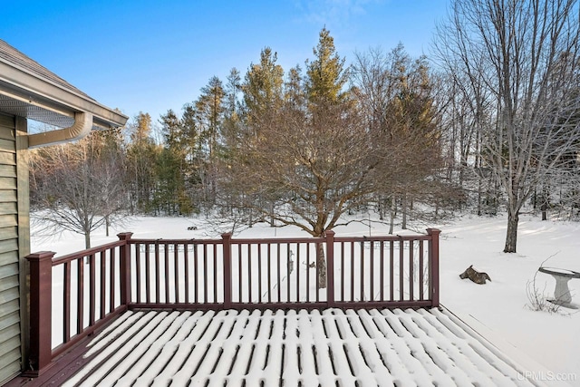 view of snow covered deck