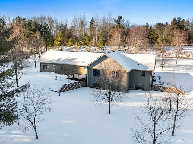 view of snow covered property