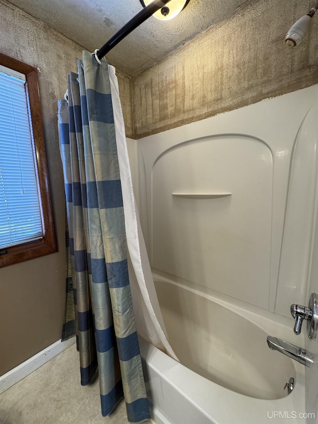 bathroom featuring shower / tub combo