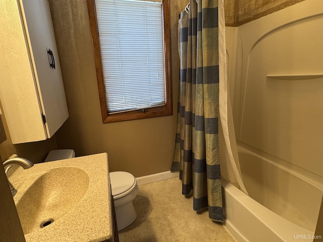 full bathroom with sink, toilet, and shower / tub combo