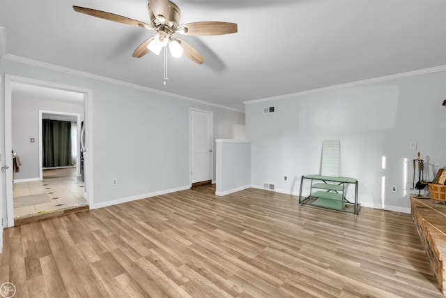 unfurnished living room featuring light hardwood / wood-style floors, ceiling fan, and ornamental molding