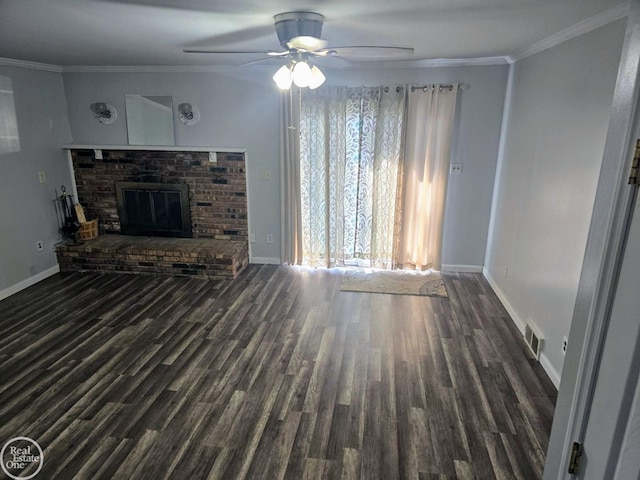 unfurnished living room featuring ceiling fan, dark hardwood / wood-style floors, crown molding, and a fireplace