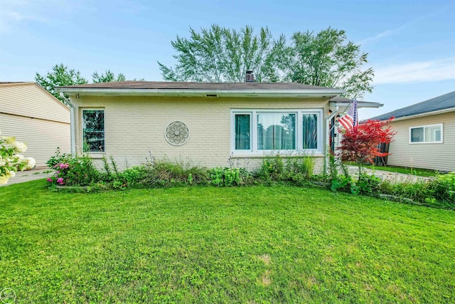 exterior space with a front yard