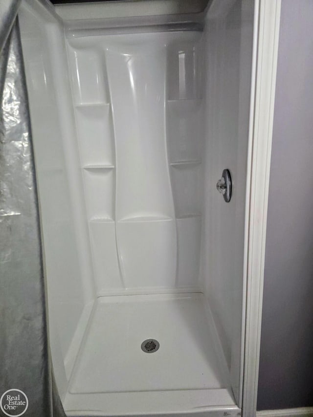 bathroom with walk in shower