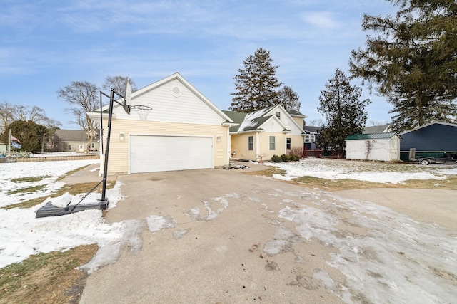 view of front of home with a garage