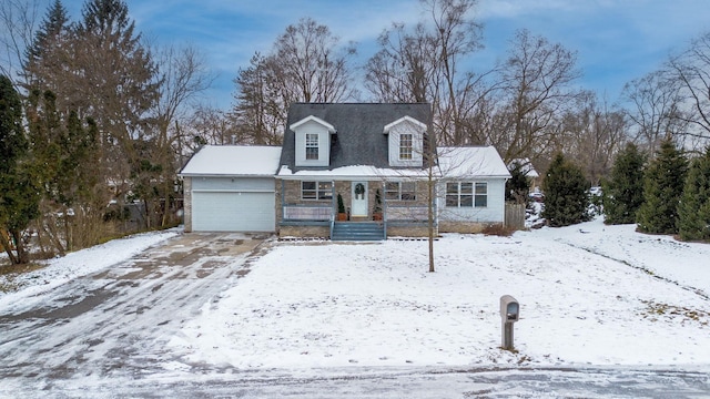 new england style home with a garage