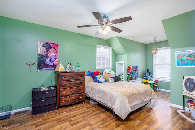 bedroom with ceiling fan and wood-type flooring